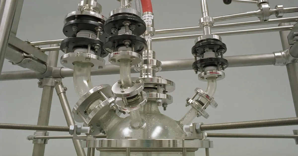 Stainless steel tubing with clamped flanged joints and ring fittings on laboratory apparatus